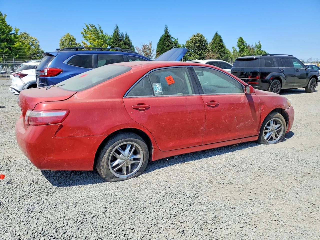 2007 Toyota Camry Le Red vin: 4T1BE46K37U139354