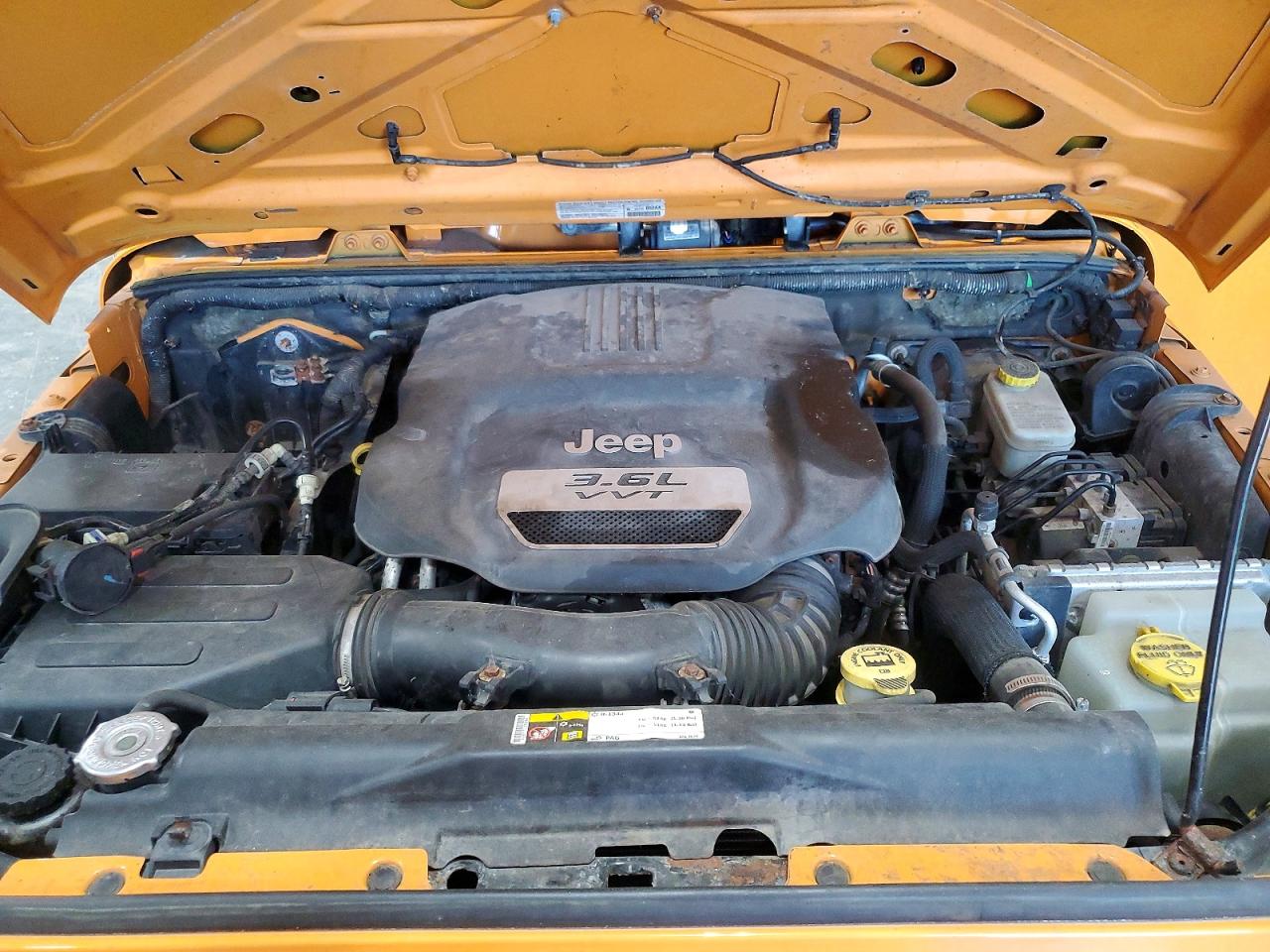 2013 Jeep Wrangler Unlimited Sport Yellow vin: 1C4BJWDG3DL557117