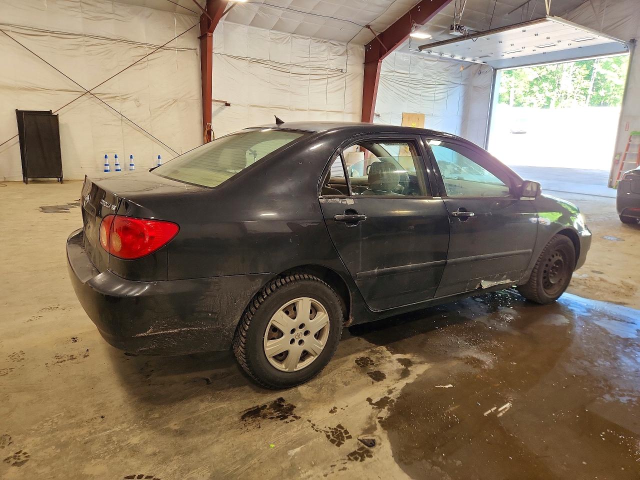 2005 Toyota Corolla Le Black vin: JTDBR32EX50057368