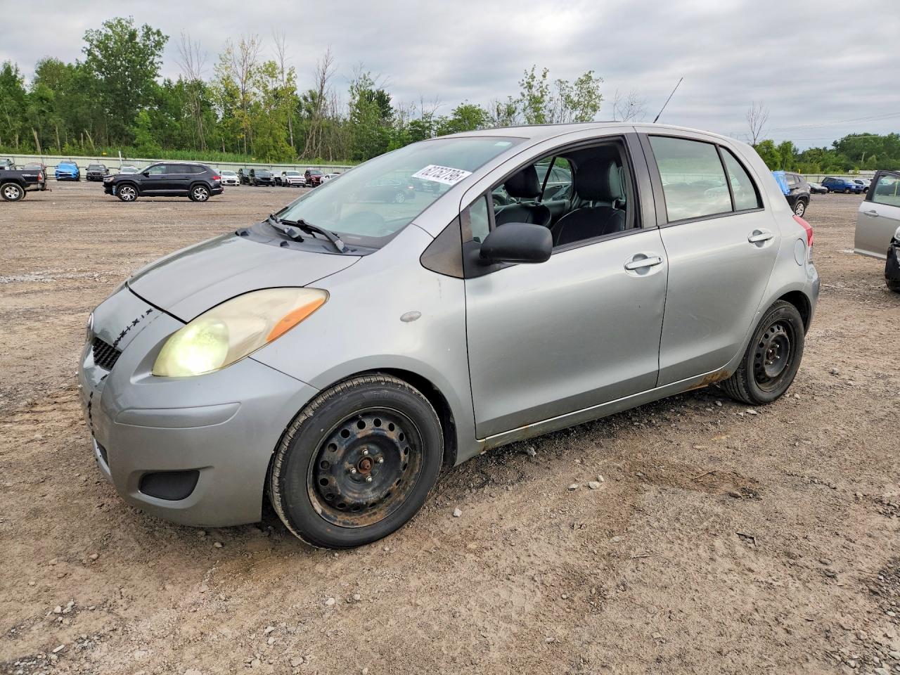 2009 Toyota Yaris Base Gray vin: JTDKT903795232612