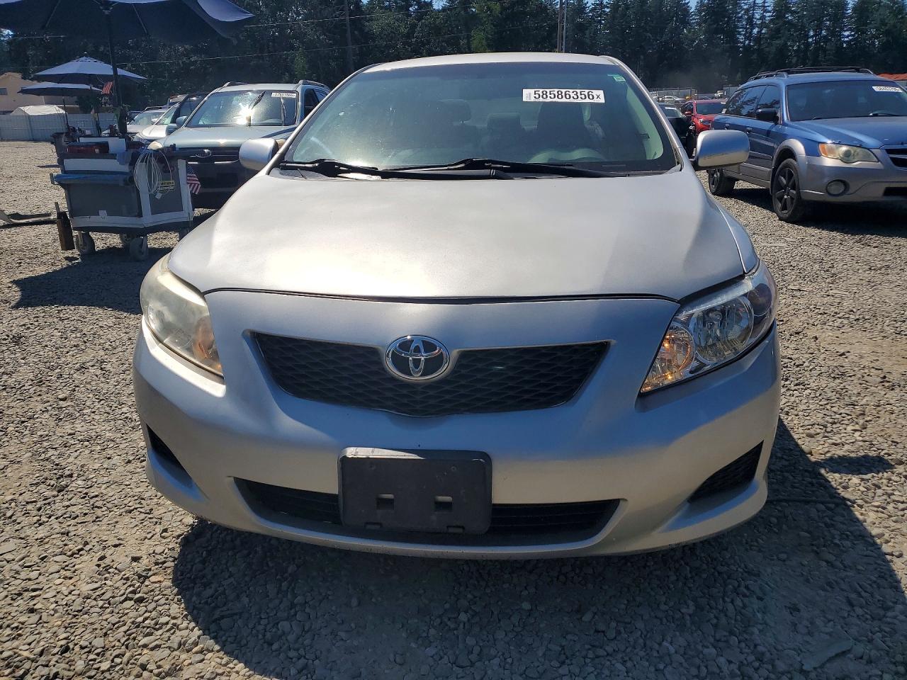 2009 Toyota Corolla Le Silver vin: 1NXBU40E89Z062666