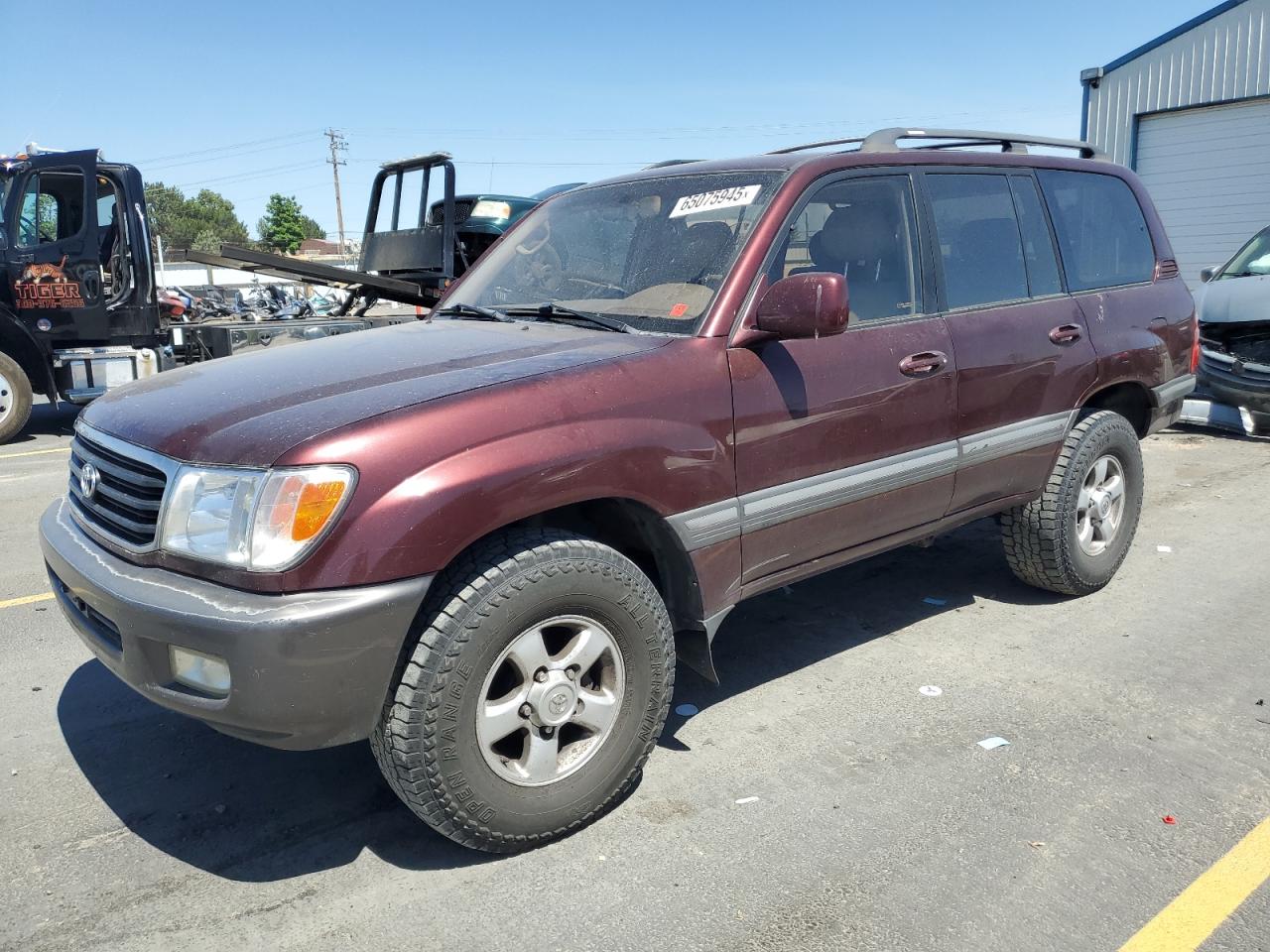 1999 Toyota Land Cruiser    Burgundy vin: JT3HT05JXX0048695