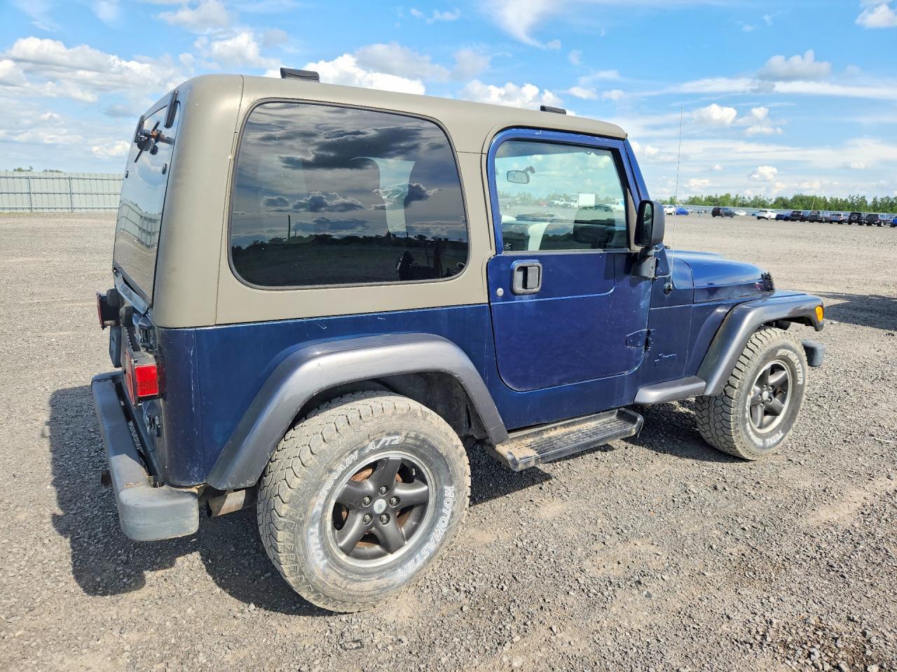 2004 Jeep Wrangler / Tj Sport Blue vin: 1J4FA49S34P724274