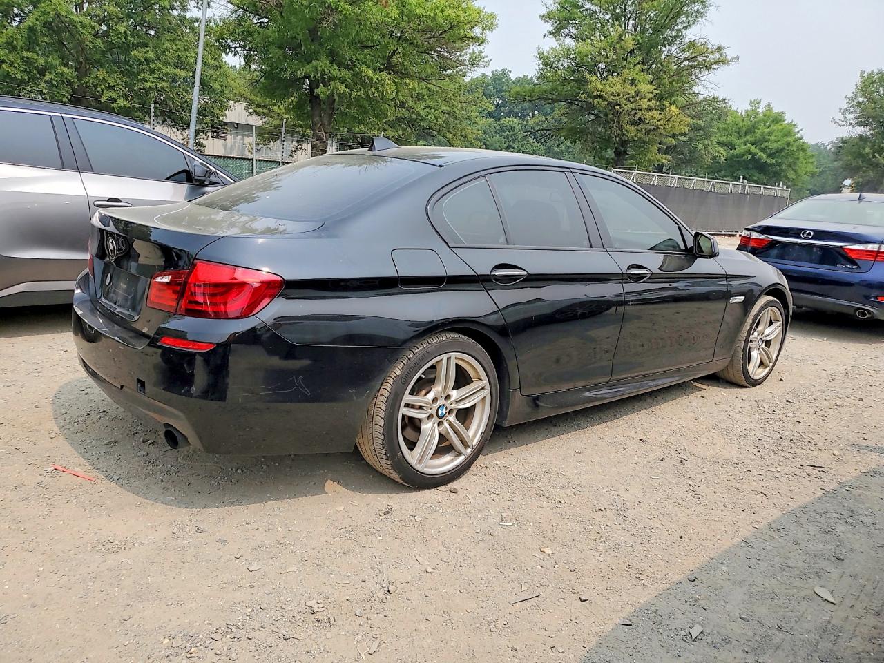 2013 Bmw 535 Xi Черный vin: WBAFU7C5XDDU75830
