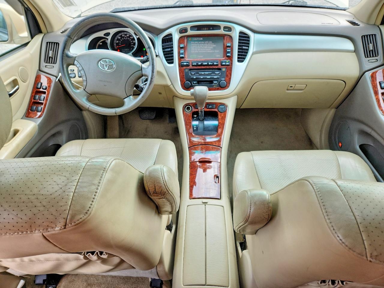 2006 Toyota Highlander Hybrid Gold vin: JTEEW21A460006749
