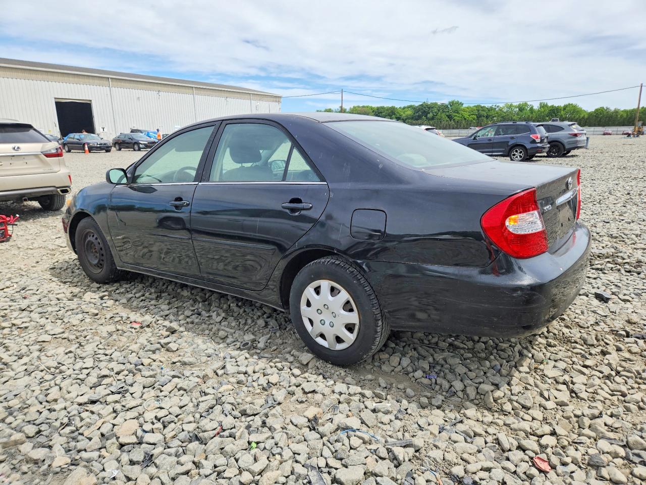 2004 Toyota Camry Le Black vin: JTDBE32K140261377