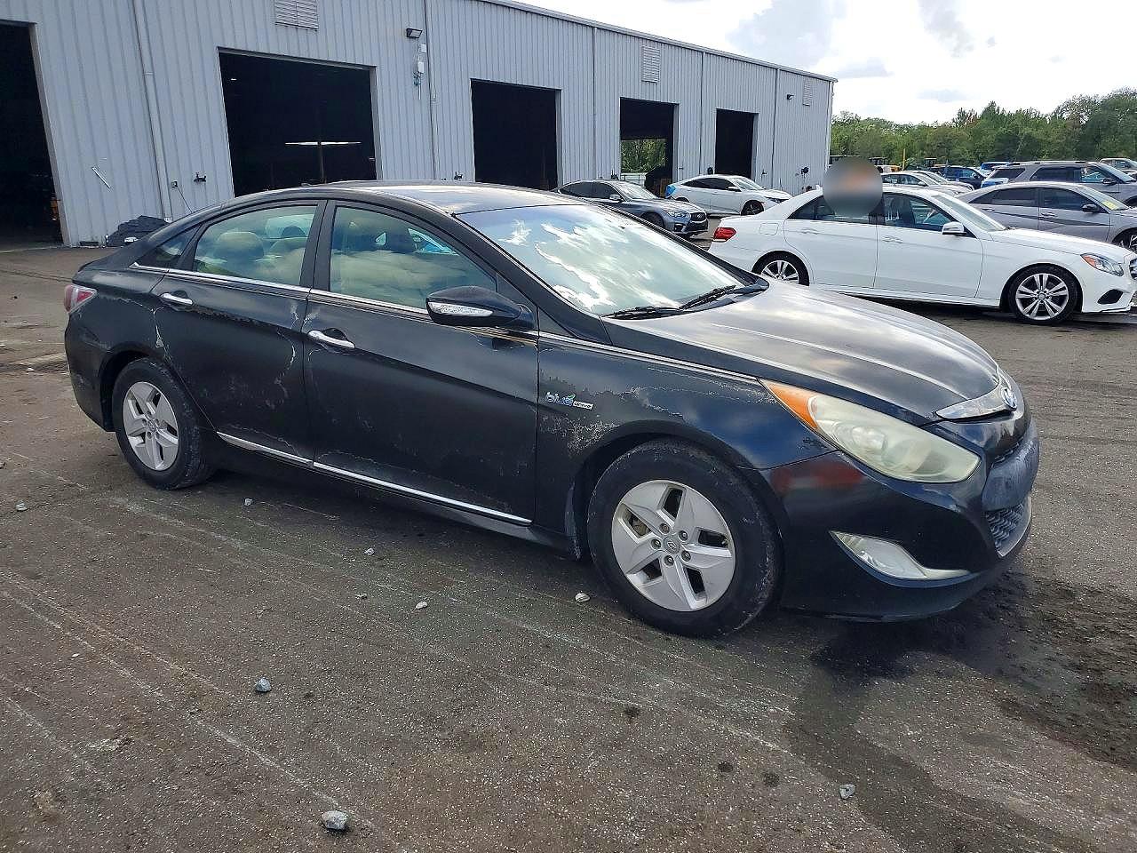 2012 Hyundai Sonata Hybrid Черный vin: KMHEC4A48CA024725