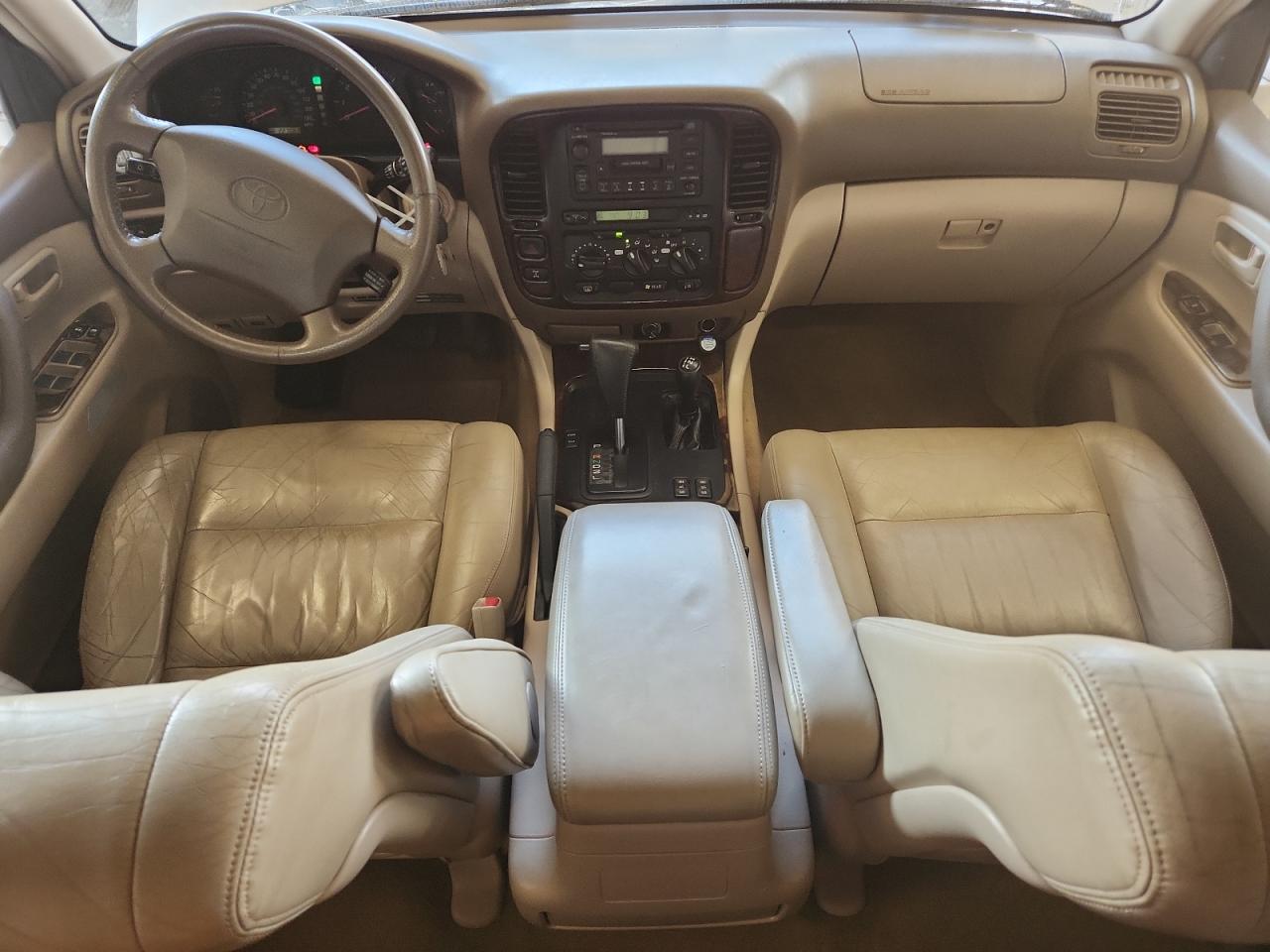 1999 Toyota Land Cruiser    Silver vin: JT3HT05J2X0067631
