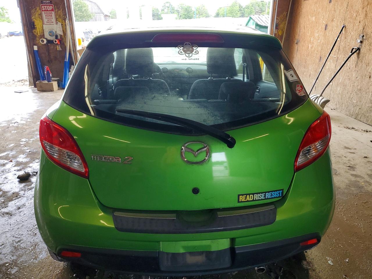 2011 Mazda Mazda2 Зеленый vin: JM1DE1HZ6B0130153