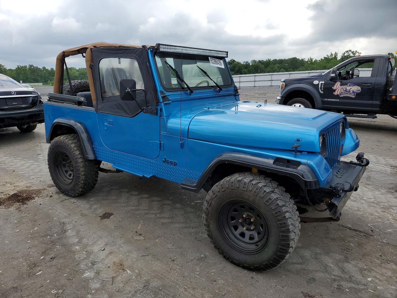 1994 Jeep Wrangler / Yj Sahara Blue vin: 1J4FY49S2RP421926