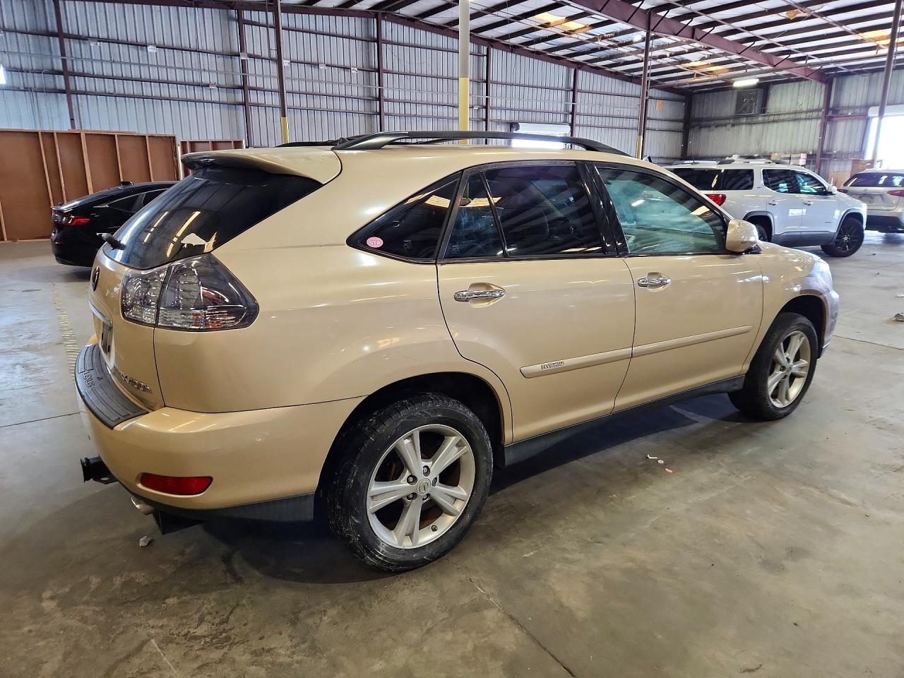 2008 Lexus Rx 400h Gold vin: JTJGW31U682007029