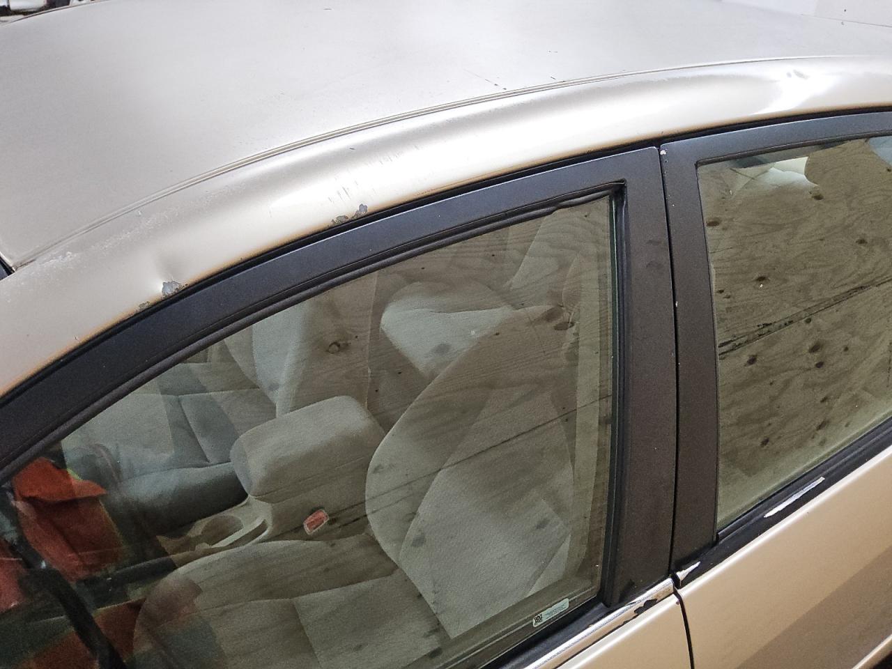 2005 Toyota Corolla Le Beige vin: 1NXBR32E35Z411090 Damage: Left Drip Rail, Multiple Dents/Paint Damage, 2