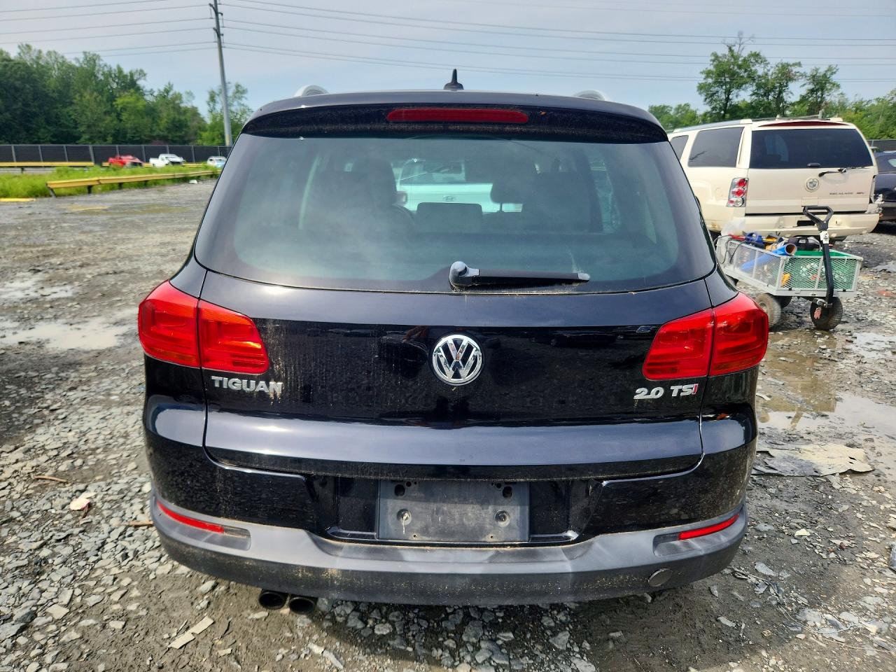 2014 Volkswagen Tiguan S Black vin: WVGAV3AXXEW608871