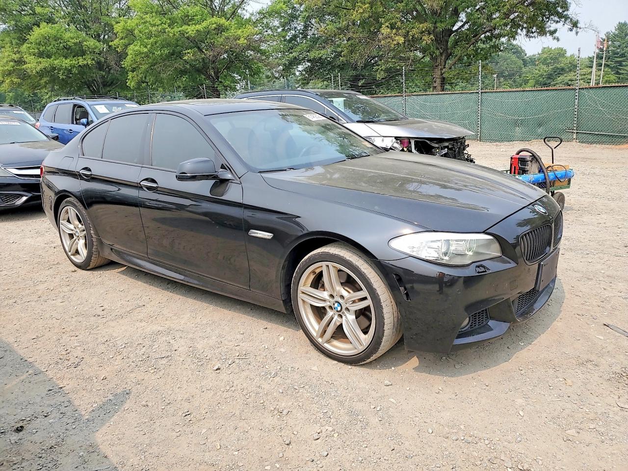 2013 Bmw 535 Xi Черный vin: WBAFU7C5XDDU75830
