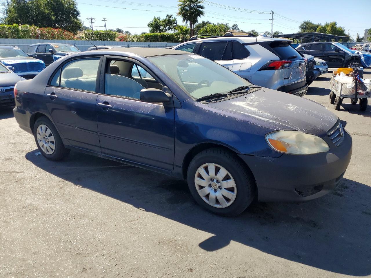 2004 Toyota Corolla Le Blue vin: 1NXBR32E84Z260617