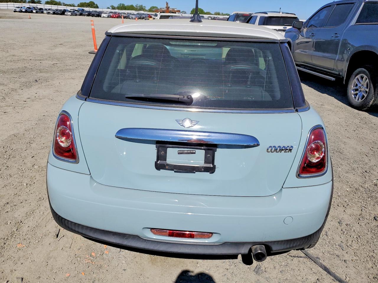 2013 Mini Cooper Turquoise vin: WMWSU3C58DT678082