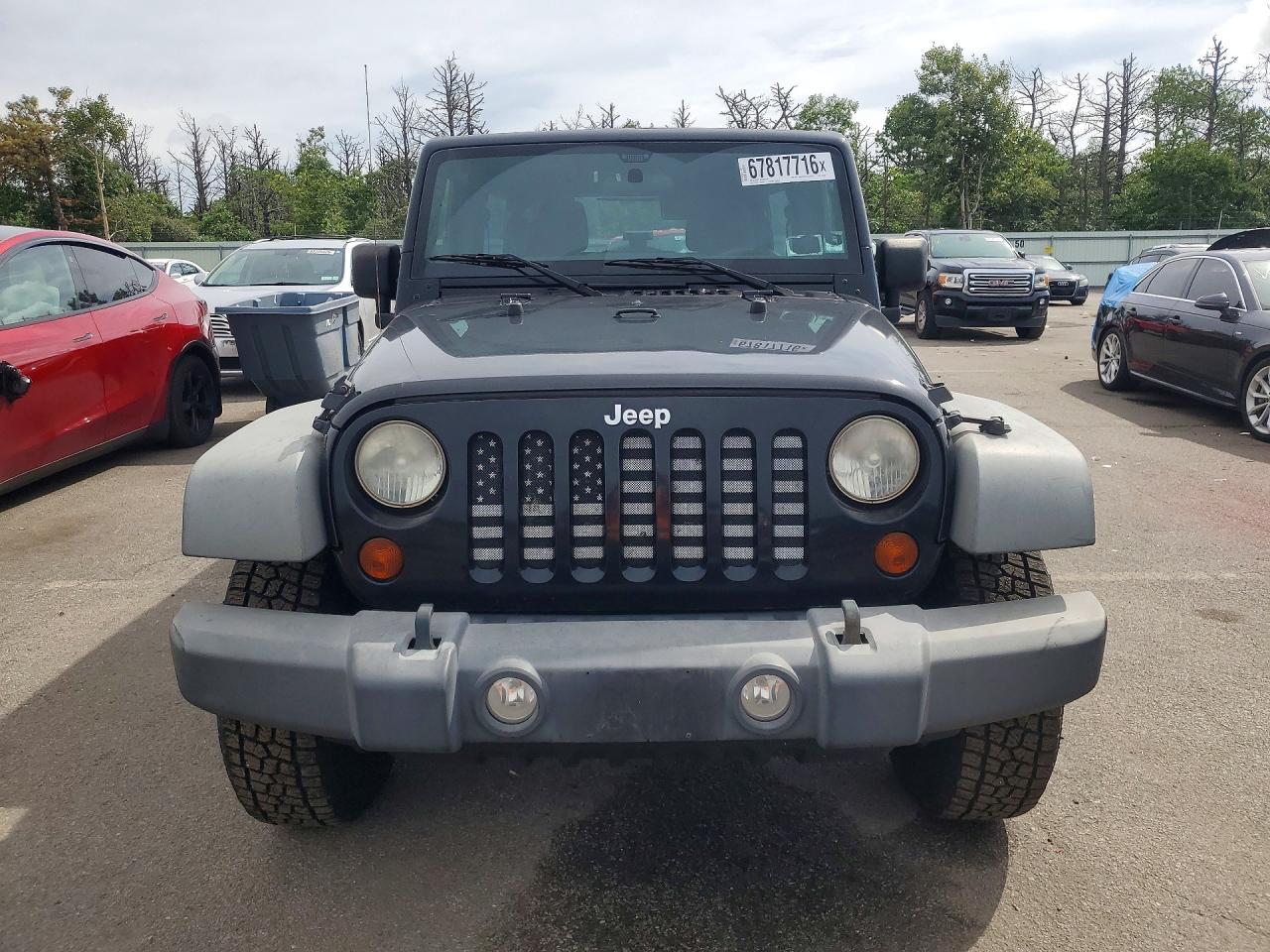 2012 Jeep Wrangler Unlimited Sport Black vin: 1C4BJWDG9CL142513