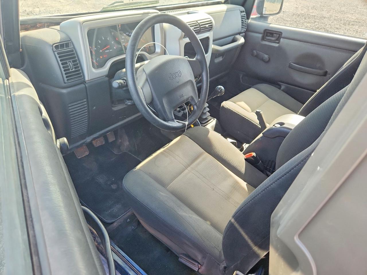 2004 Jeep Wrangler / Tj Sport Blue vin: 1J4FA49S34P724274