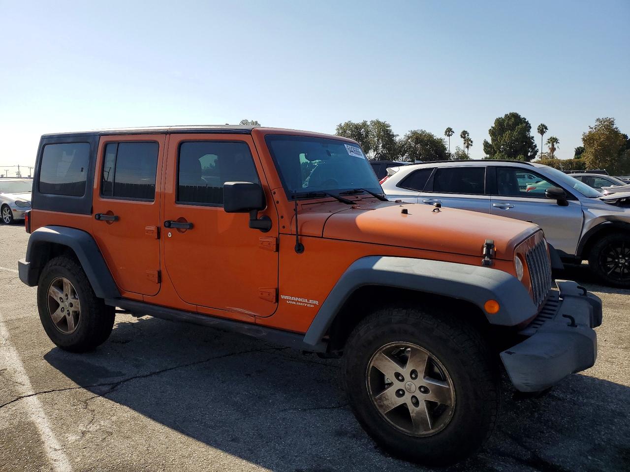 2011 Jeep Wrangler Unlimited Sport Оранжевый vin: 1J4HA3H13BL520624