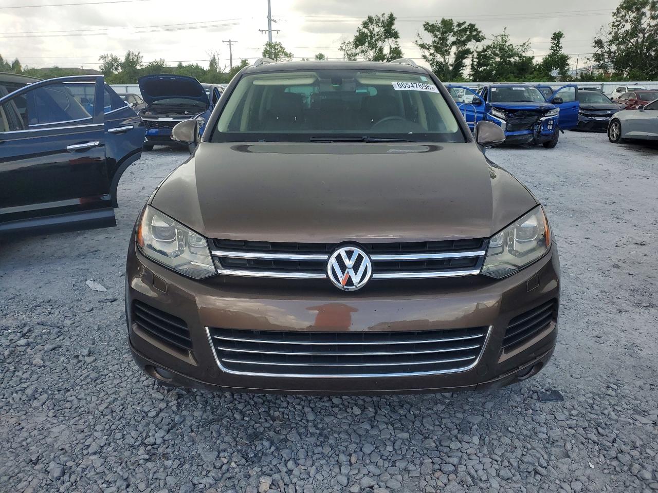 2014 Volkswagen Touareg V6 Tdi Brown vin: WVGEP9BP9ED008822
