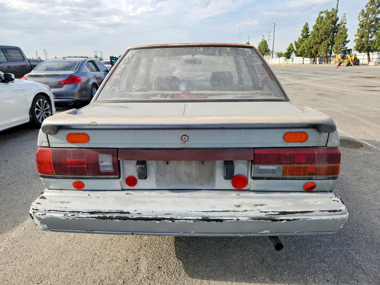 1990 Nissan Sentra Base Blue vin: 1N4GB22B8LC790496