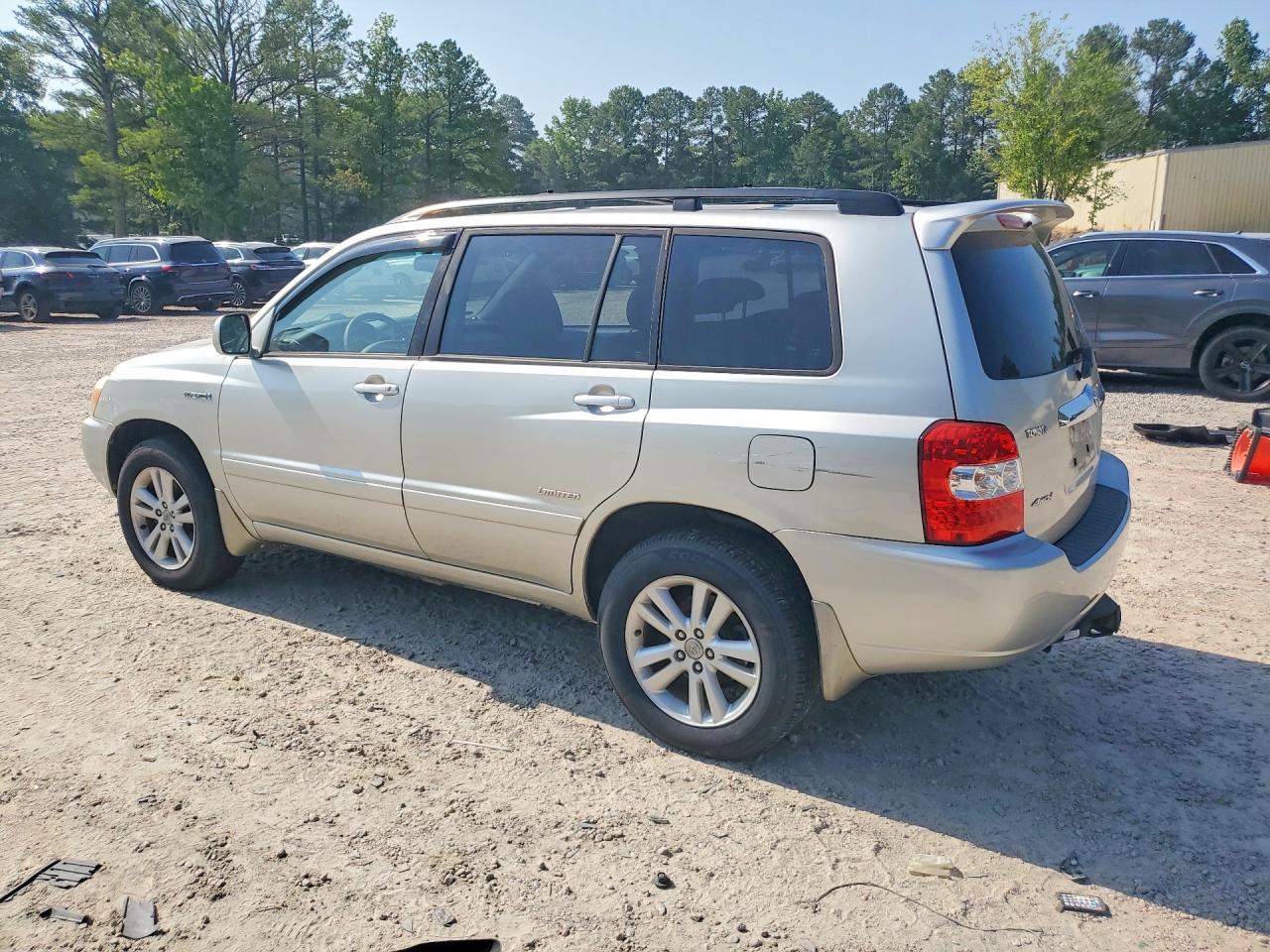 2006 Toyota Highlander Hybrid Gold vin: JTEEW21A860021738