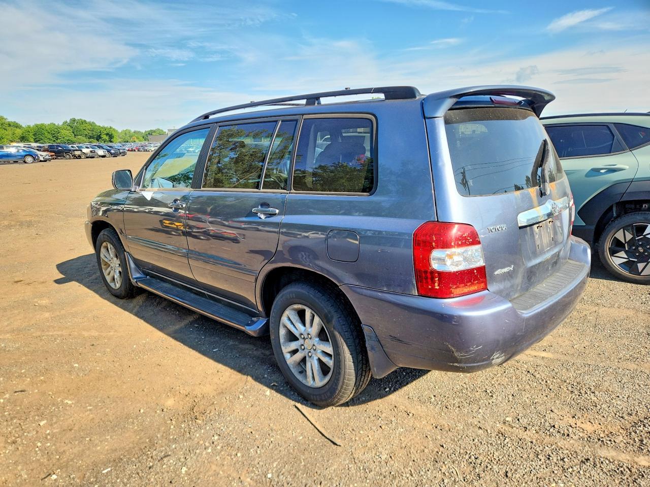 2006 Toyota Highlander Hybrid Blue vin: JTEEW21A960004768