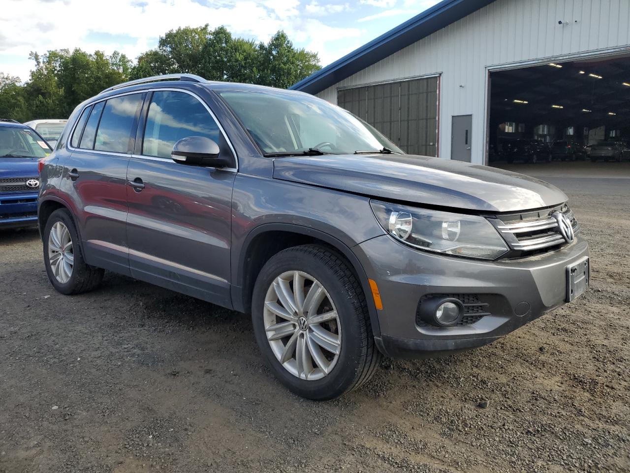 2012 Volkswagen Tiguan S Серый vin: WVGBV7AXXCW078507