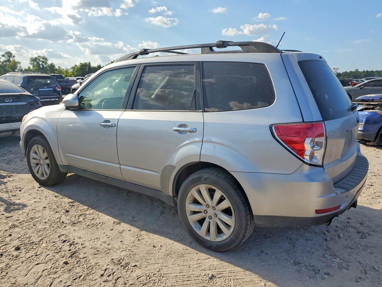 2012 Subaru Forester Limited Silver vin: JF2SHBEC7CH412911
