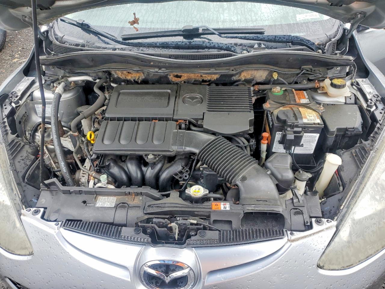 2014 Mazda Mazda2 Sport Серебряный vin: JM1DE1KZ1E0176695
