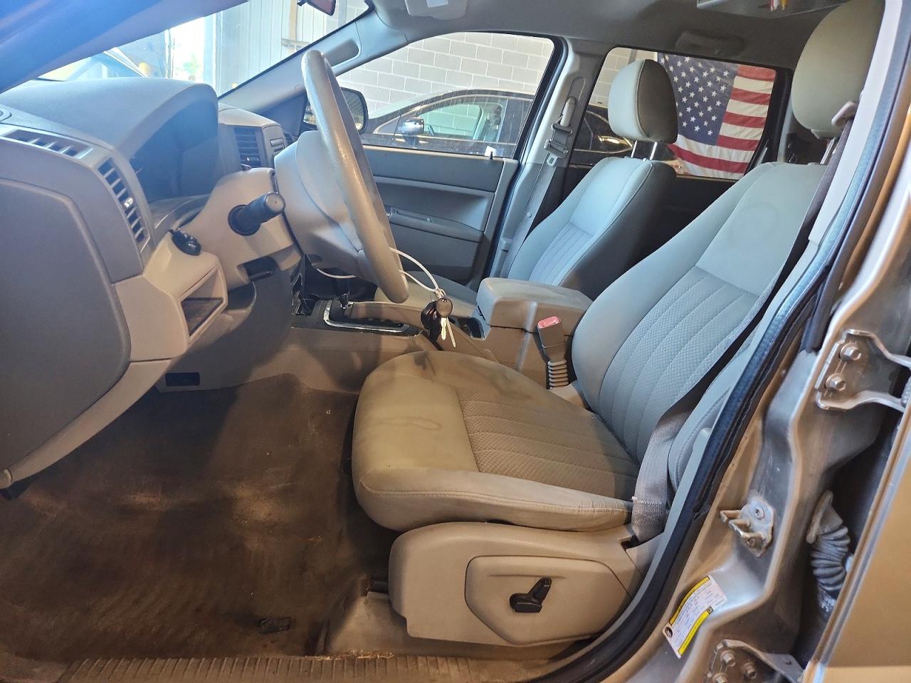 2006 Jeep Grand Cherokee Laredo Tan vin: 1J4GR48K56C289492