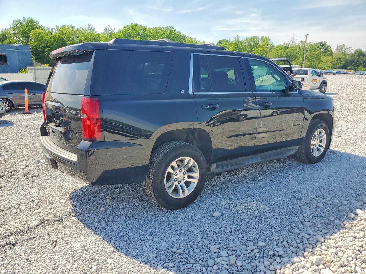 2015 Chevrolet Tahoe K1500 Lt Черный vin: 1GNSKBKC5FR195174