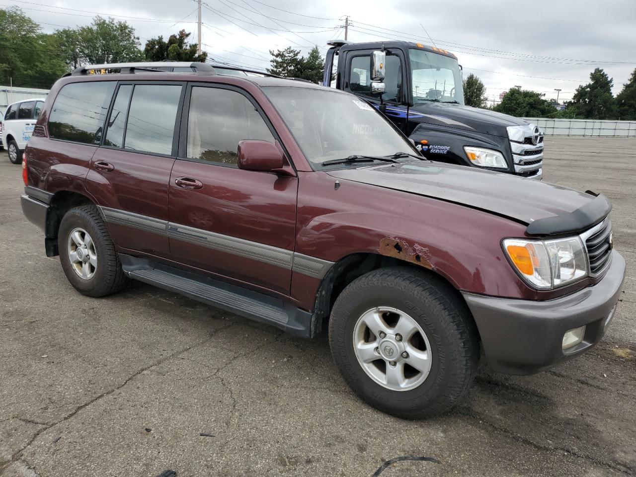 1999 Toyota Land Cruiser Burgundy vin: JT3HT05J9X0069506