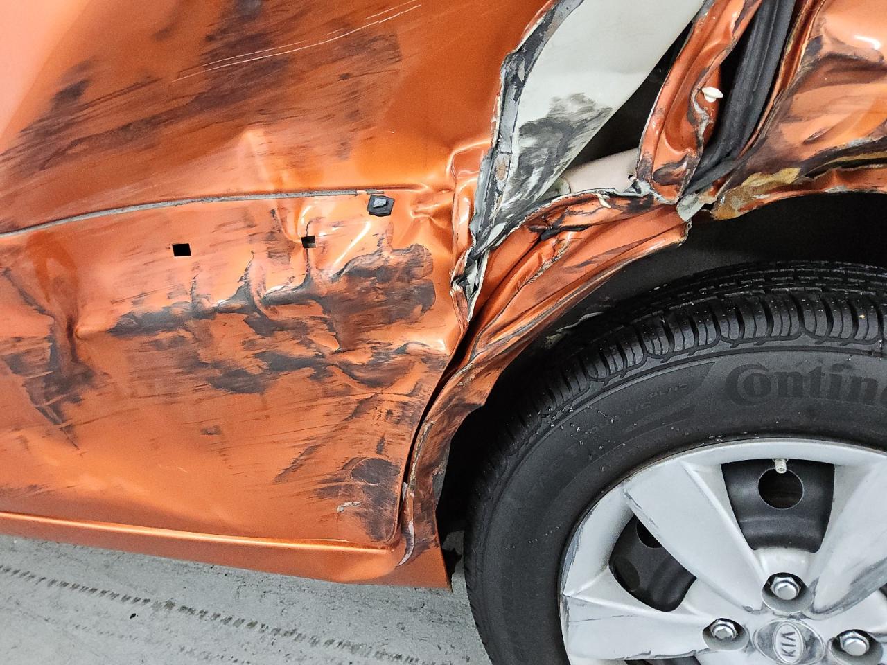 2009 Kia Rio5 Lx Orange vin: KNADE243896567101 Damage: Left Rocker Panel, Dent(S) W/ Paint Dmg, > 12 Inches