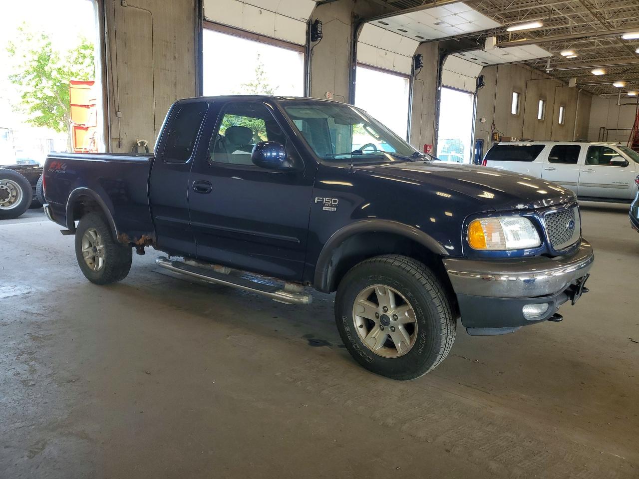 2003 Ford F150 Blue vin: 1FTRX18L53NB34419