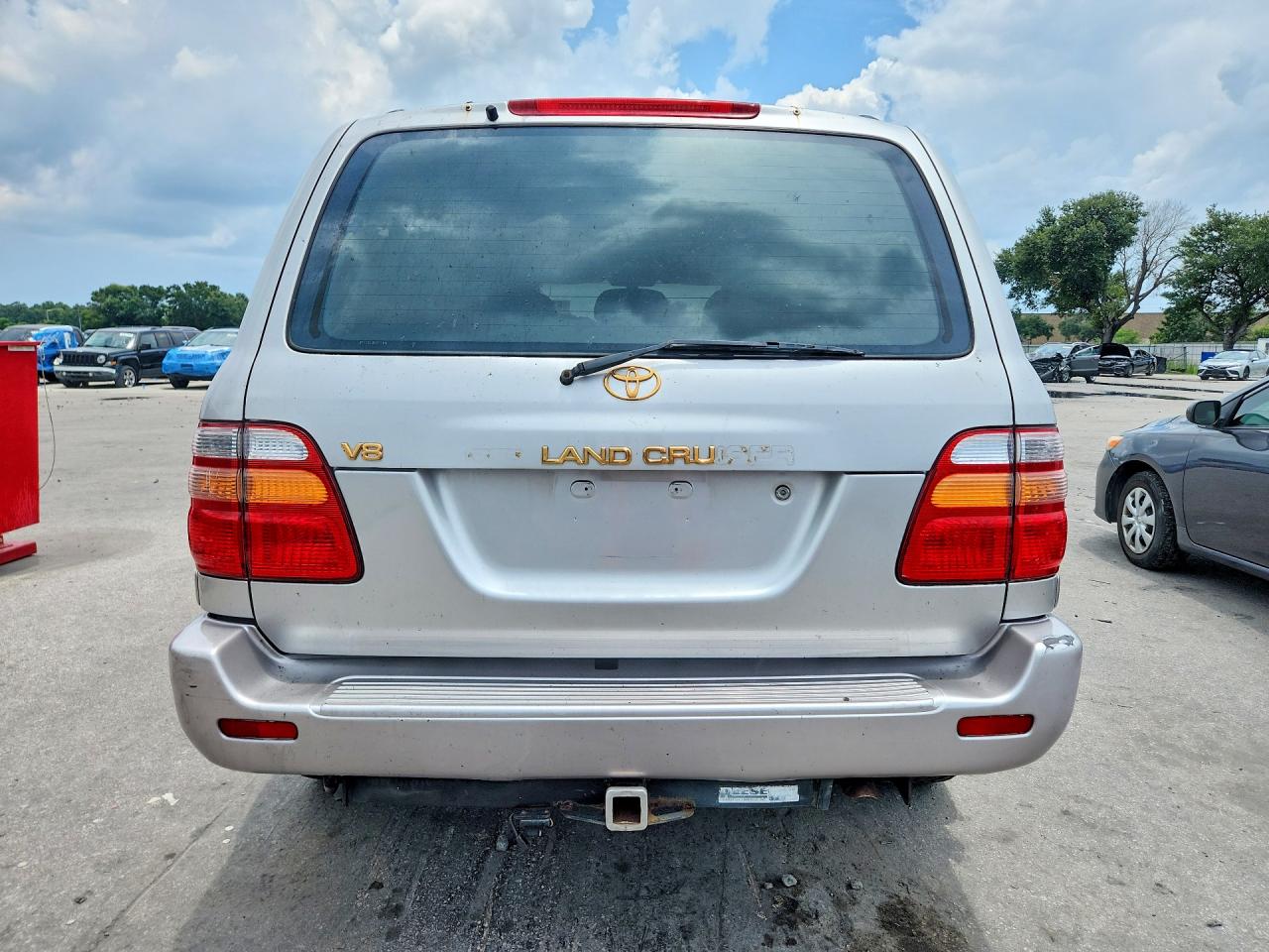1999 Toyota Land Cruiser Base Gold vin: JT3HT05J5X0027141