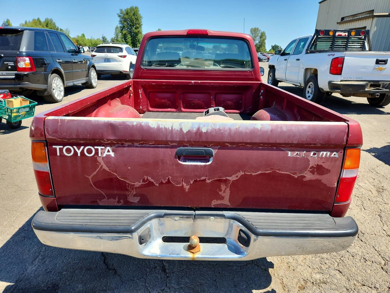 1999 Toyota Tacoma Base Red vin: 4TANL42N5XZ557999