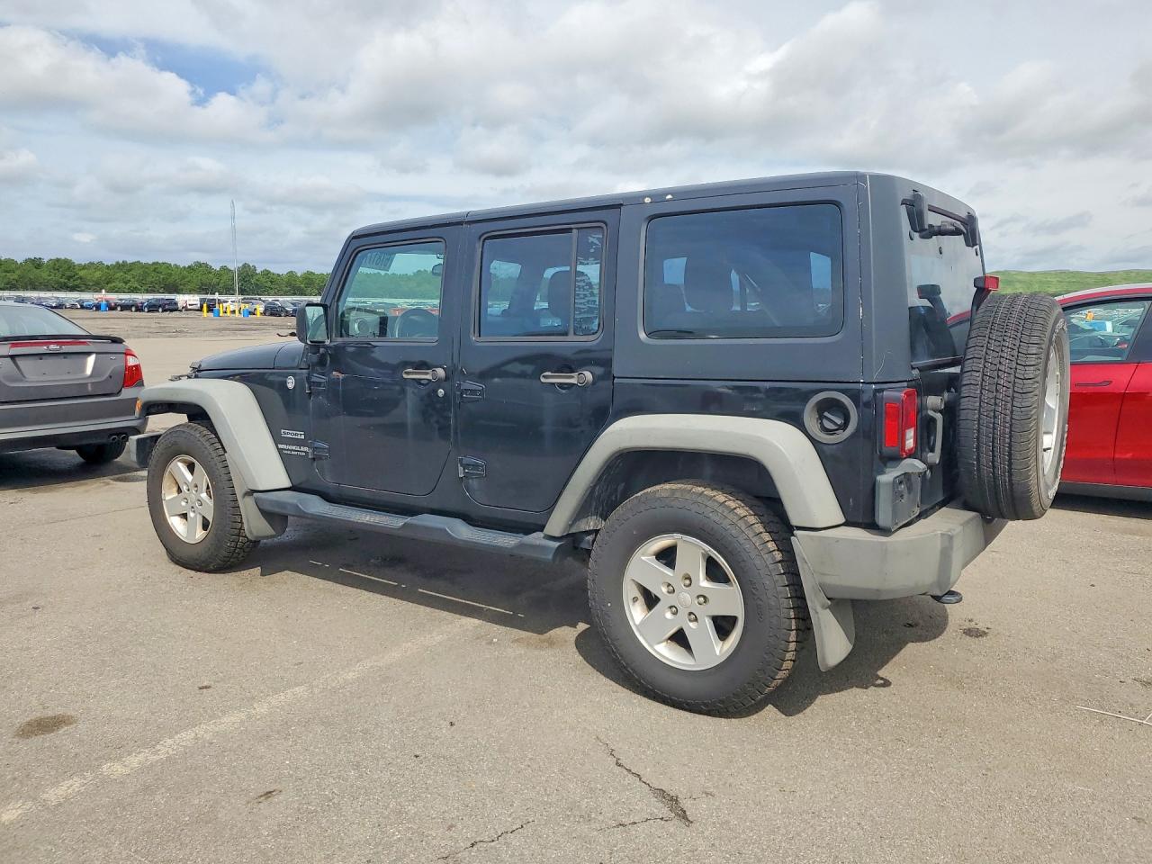 2012 Jeep Wrangler Unlimited Sport Black vin: 1C4BJWDG9CL142513