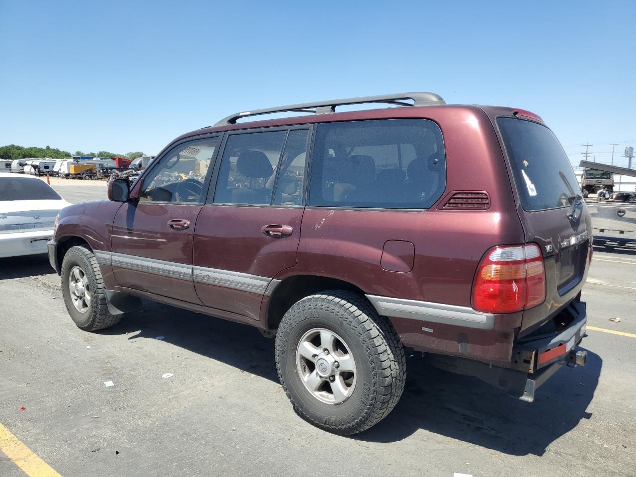 1999 Toyota Land Cruiser    Burgundy vin: JT3HT05JXX0048695