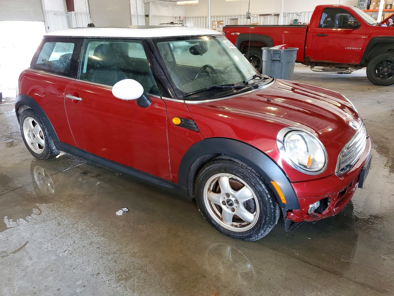 2009 Mini Cooper Maroon vin: WMWMF33519TU70314