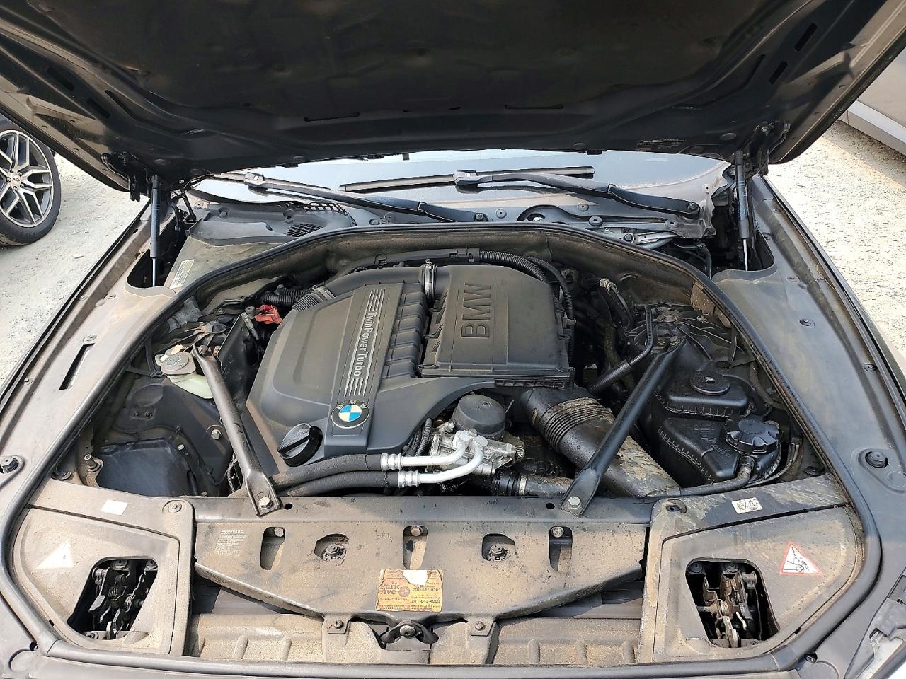 2013 Bmw 535 Xi Черный vin: WBAFU7C5XDDU75830