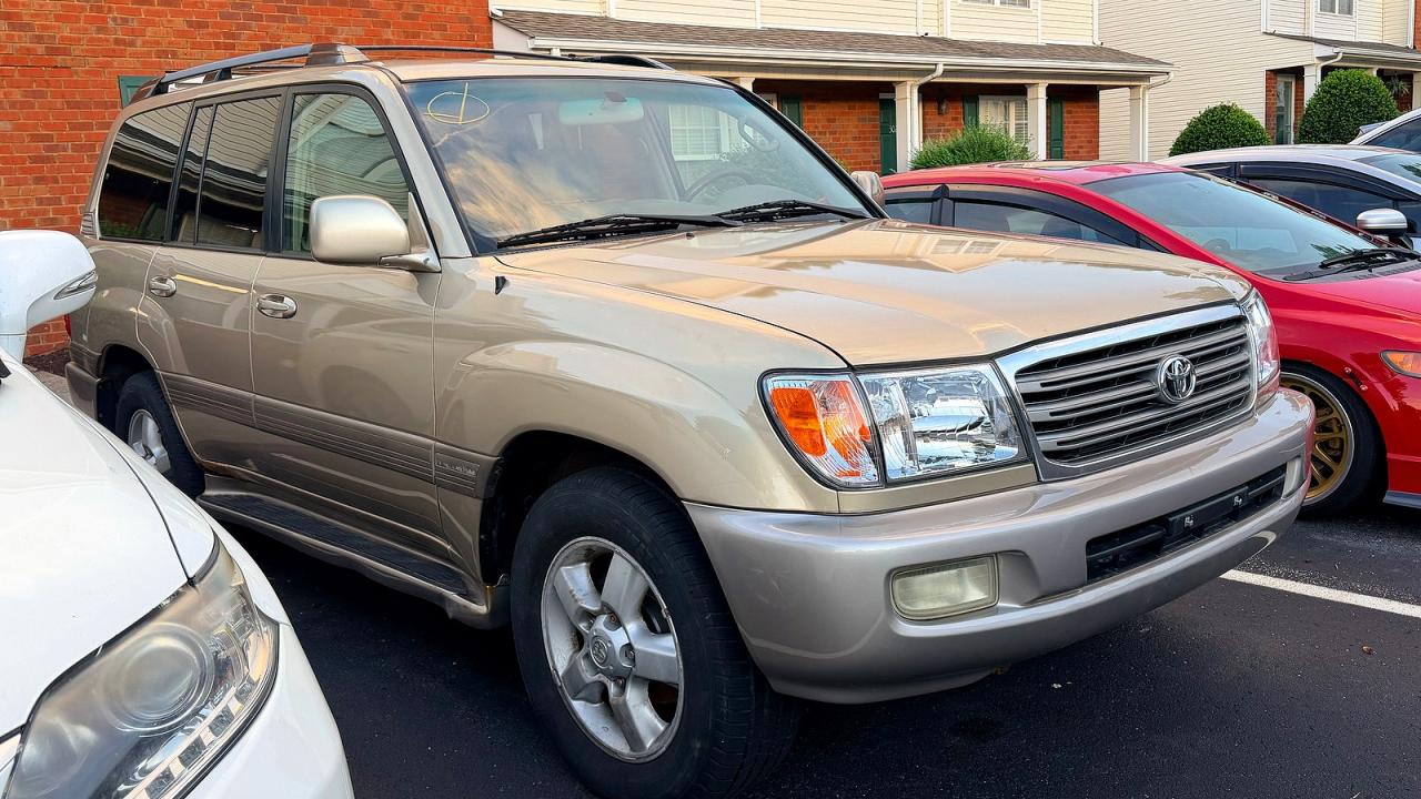 2004 Toyota Land Cruiser Base Gold vin: JTEHT05J742060388