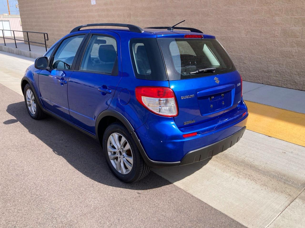 2013 Suzuki Sx4 Blue vin: JS2YB5A31D6101902