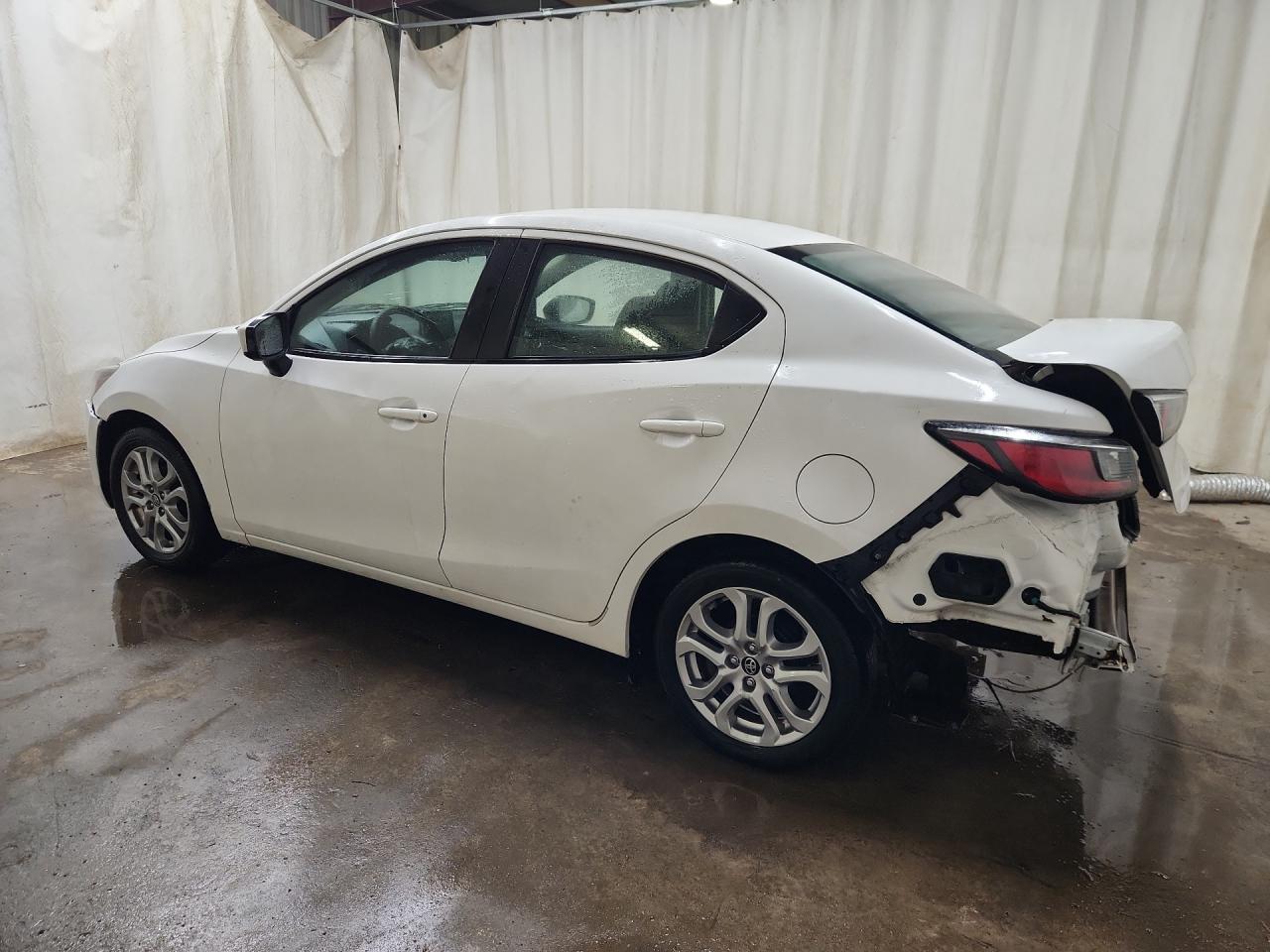 2018 Toyota Yaris Ia Base White vin: 3MYDLBYVXJY311299 Damage: Rear Bumper, Missing, Replacement Required