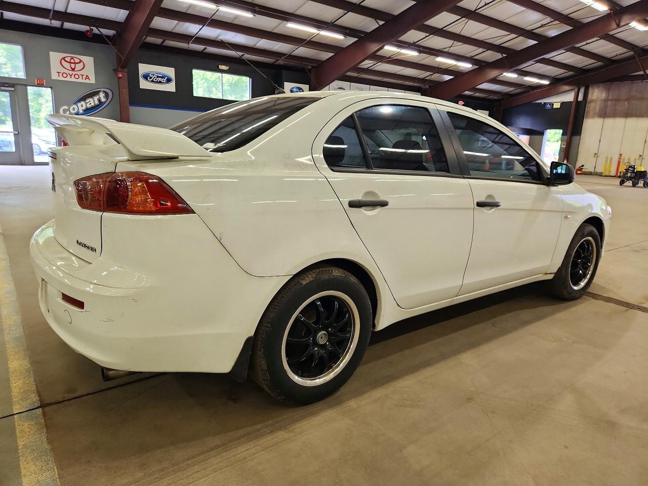 2009 Mitsubishi Lancer De White vin: JA3AU16U39U002385