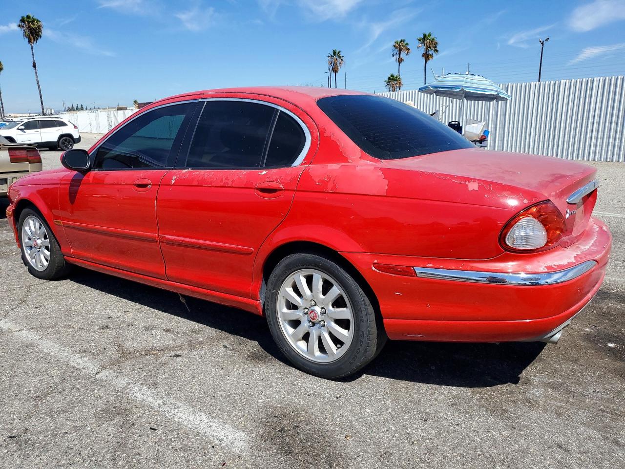 2003 Jaguar X-type 2.5 Red vin: SAJEA51D33XC86945