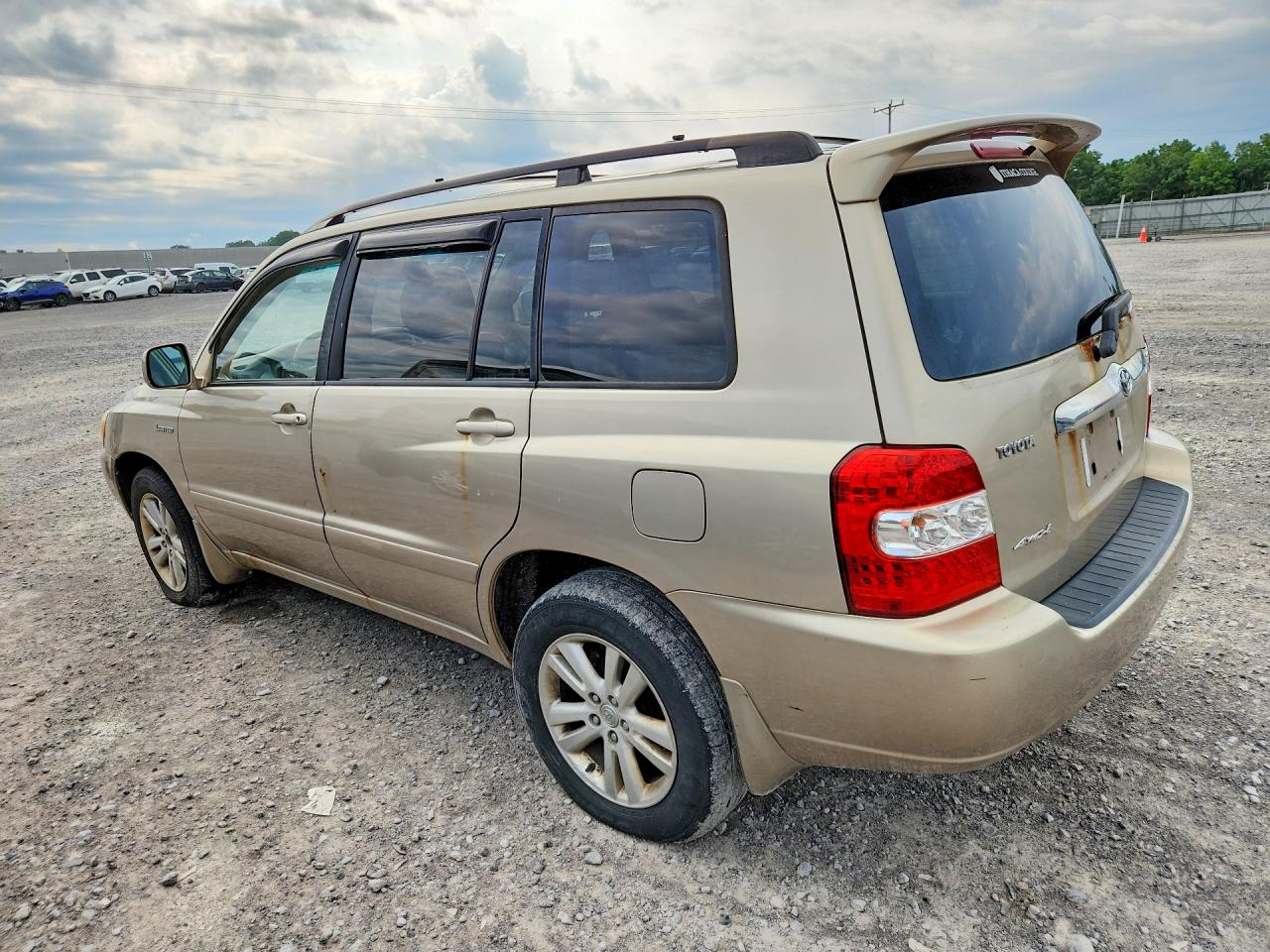 2006 Toyota Highlander Hybrid Gold vin: JTEEW21A460006749