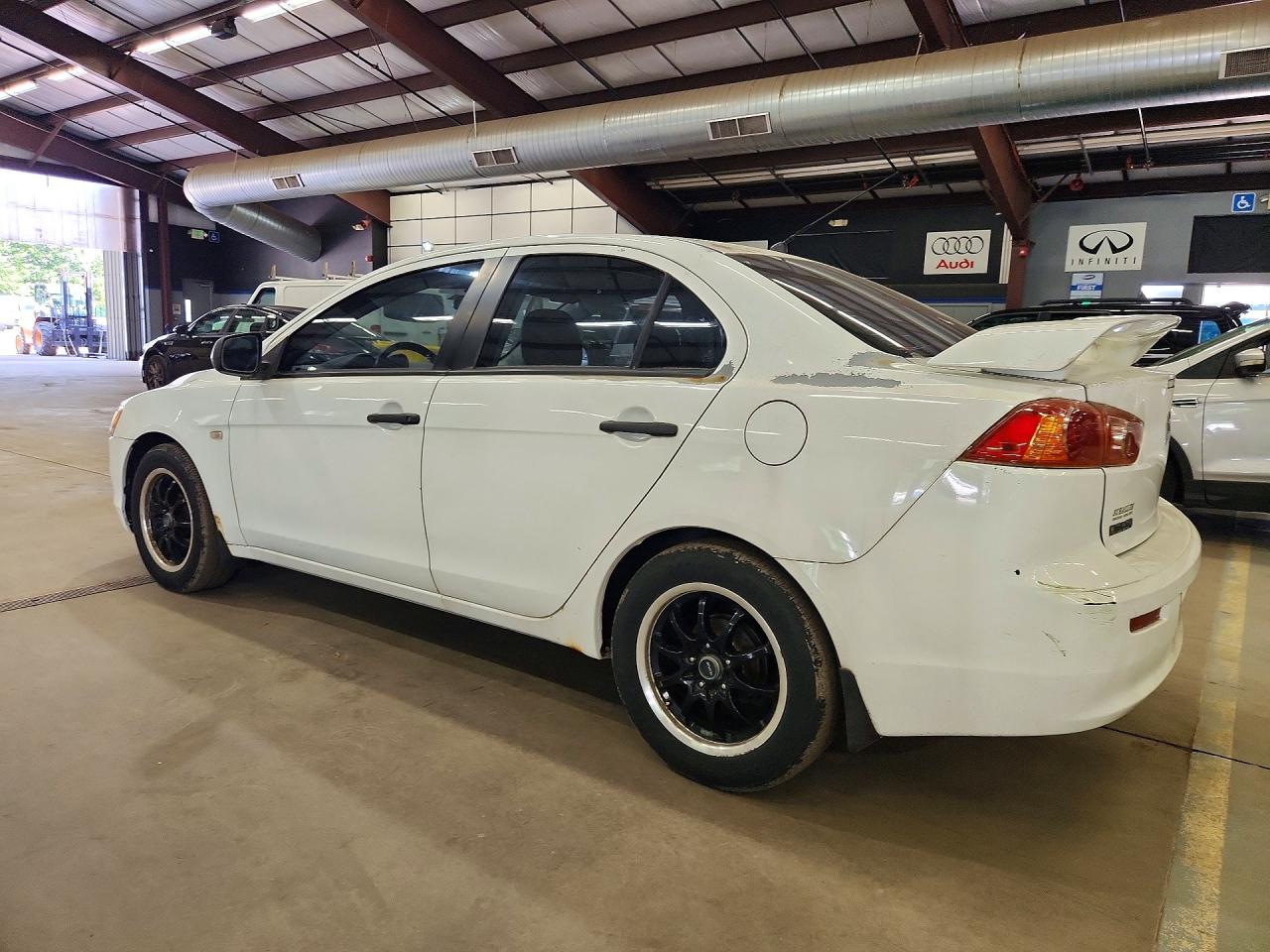 2009 Mitsubishi Lancer De White vin: JA3AU16U39U002385