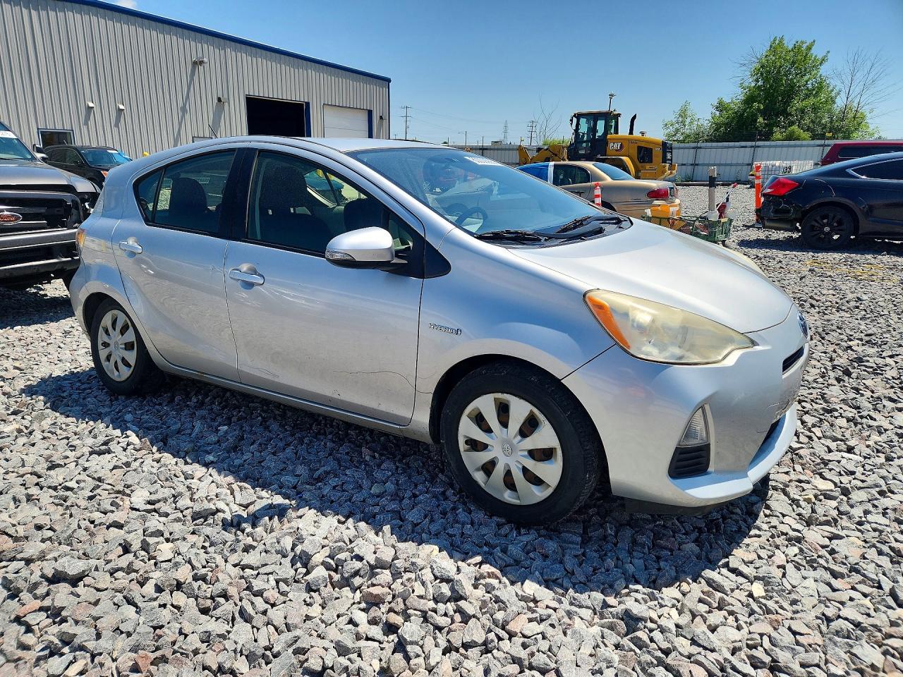 2012 Toyota Prius C Two Серебряный vin: JTDKDTB3XC1511168