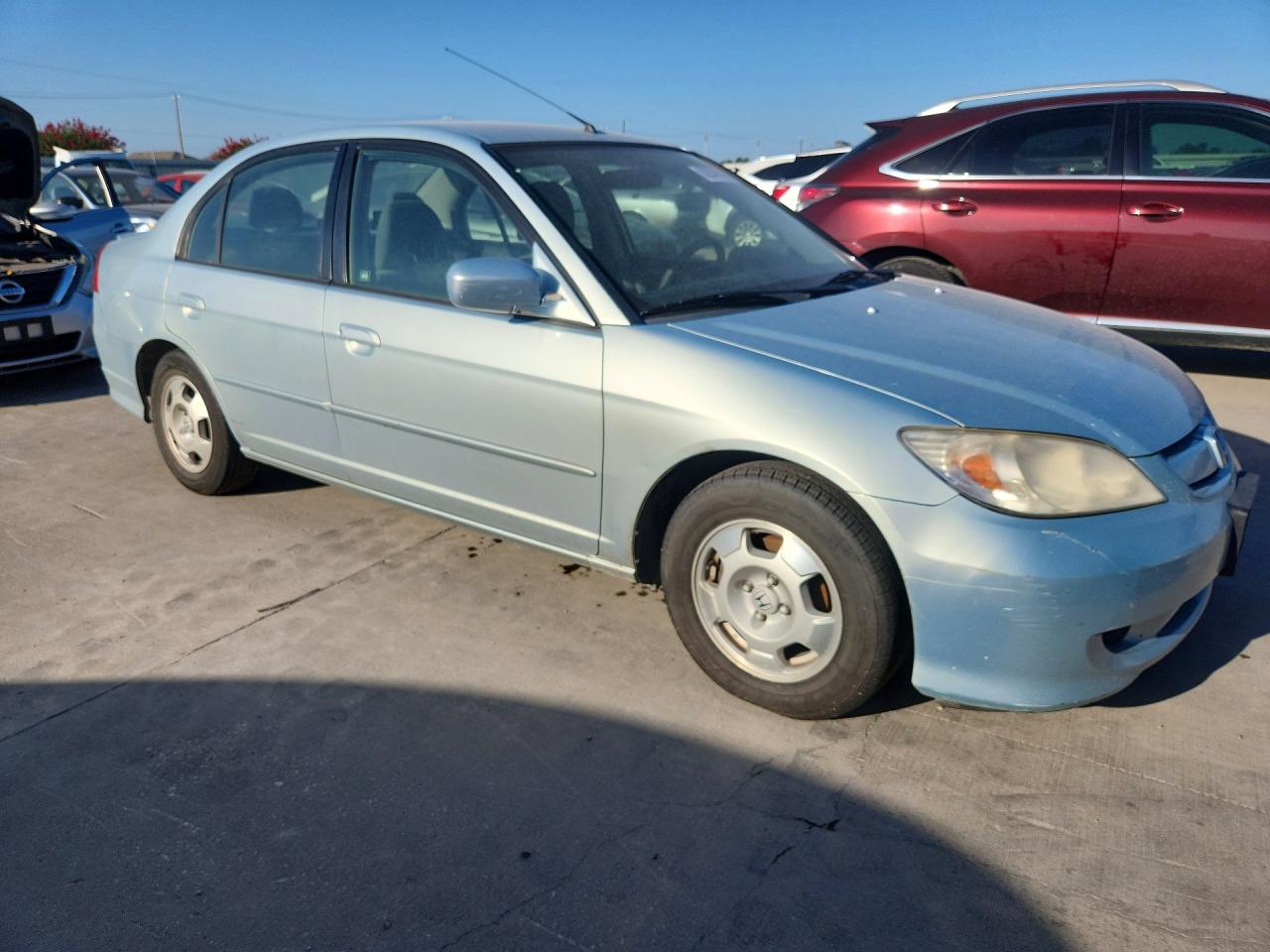 2004 Honda Civic Hybrid Blue vin: JHMES96684S017122